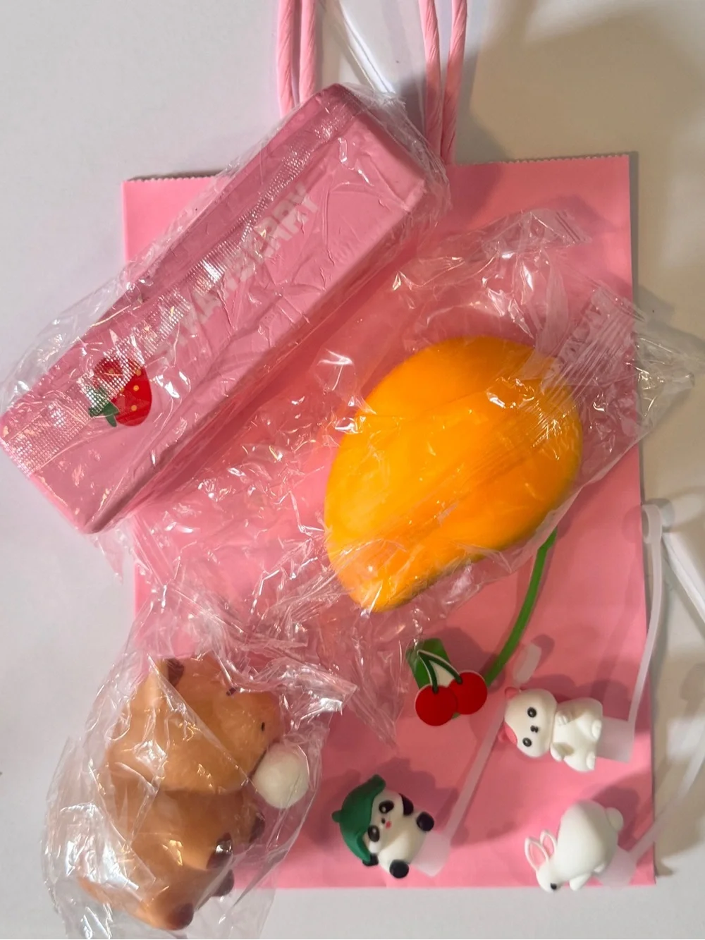 Kids Pink Gift Bag with Yellow Mango Toy and Cute Animal Squishies